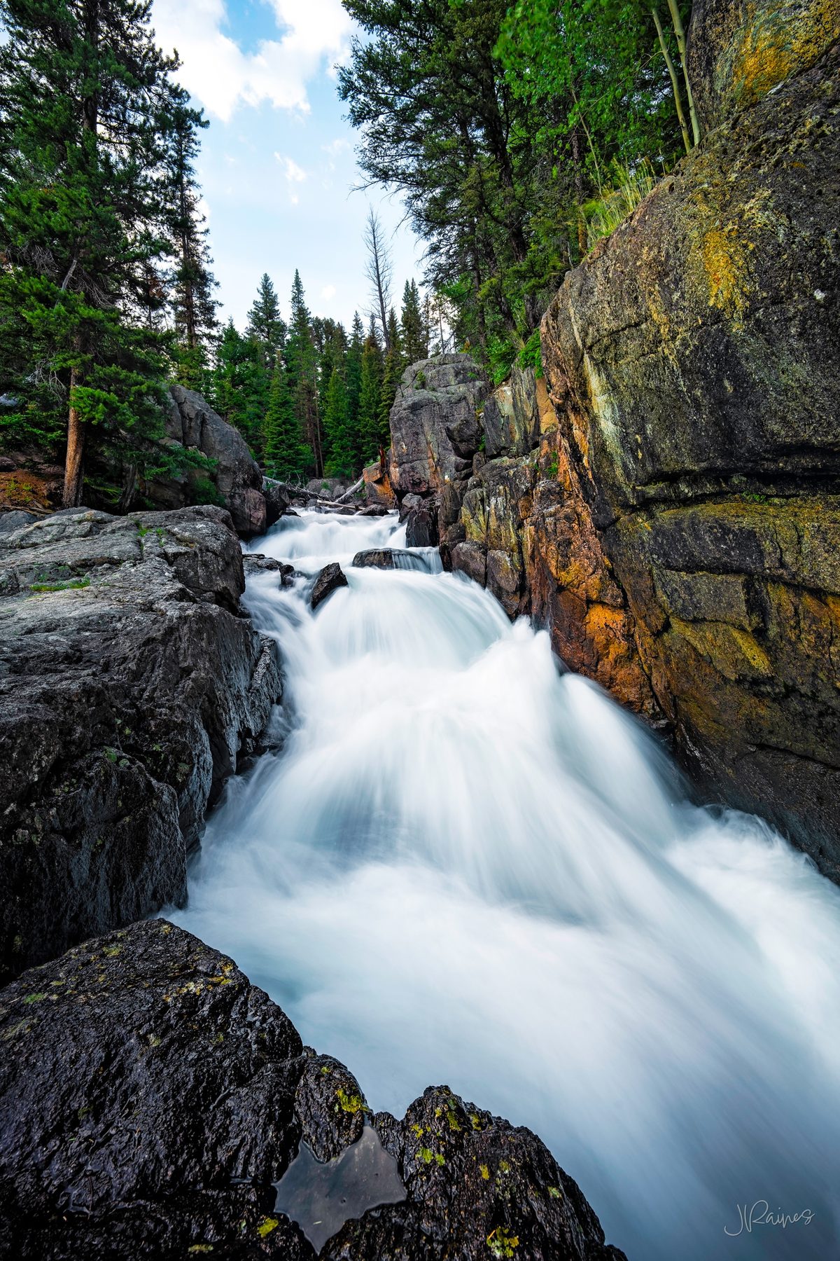 Rushing waterfall outside of Yellowstone