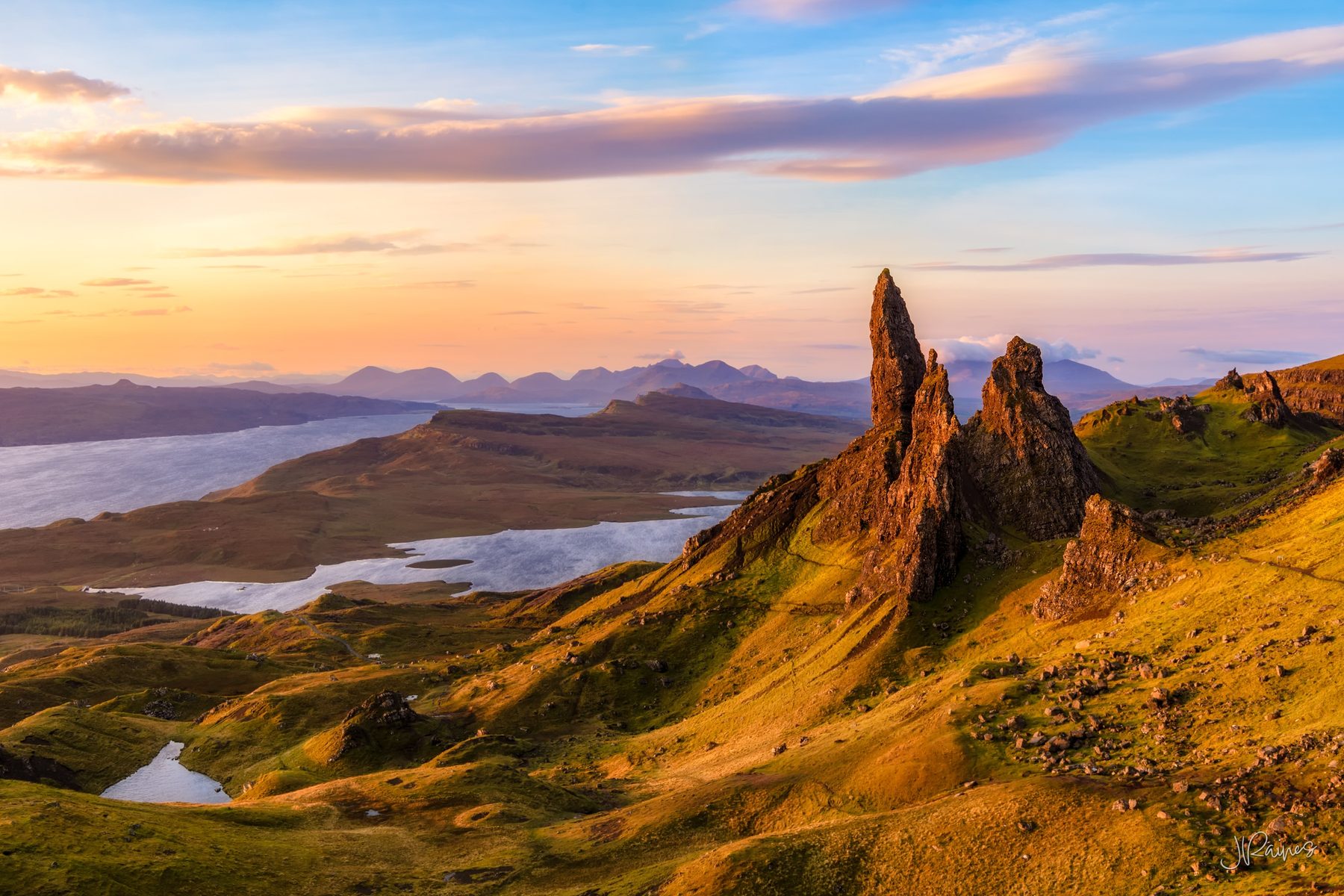 The Old Man of Storr at sunrise with clouds, Isle of Skye, Scotland
