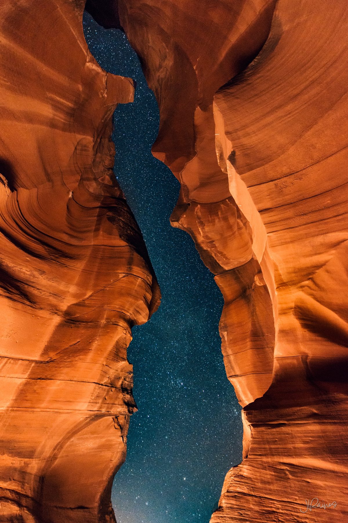 Antelope Canyon entrance at night looking out to a starry sky, Page, Arizona