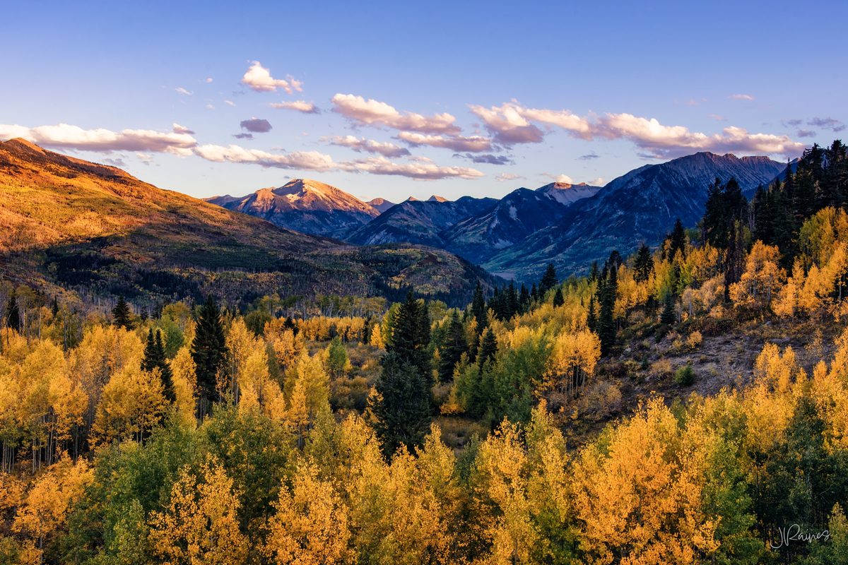 McClure Pass in Colorado with autumn aspens and evening sun