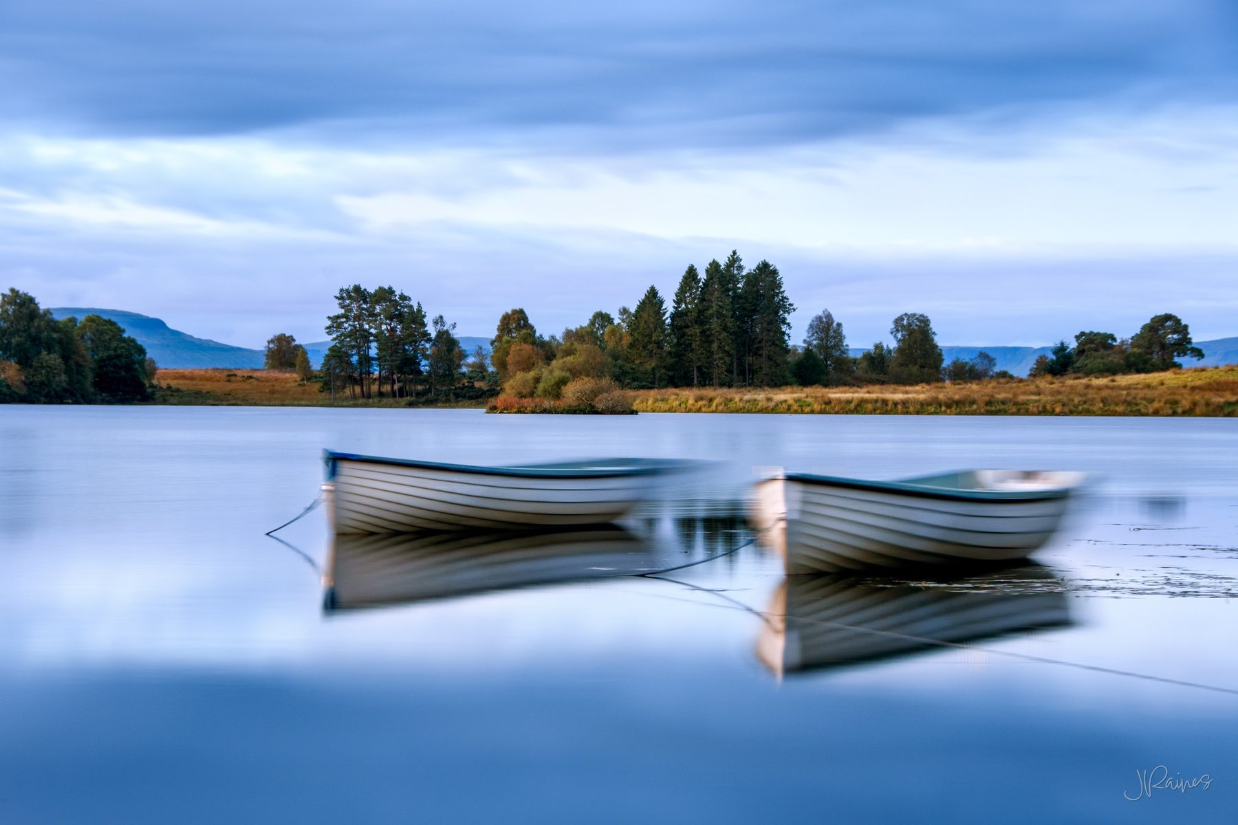 Trout boats on Loch Rusky during a windy Scottish morning, The Trossachs, Scotland