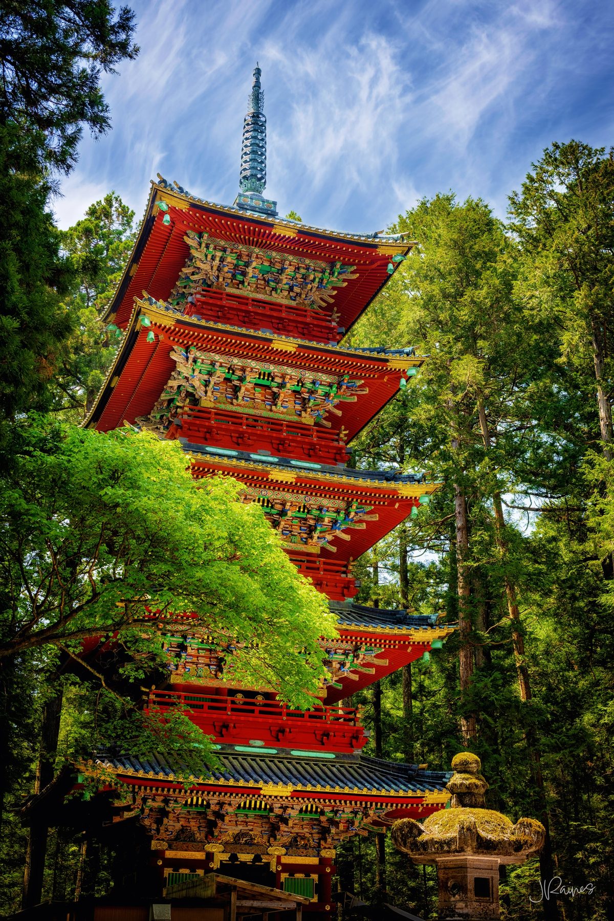 Colorful Japanese pagoda in the forest of Nikko