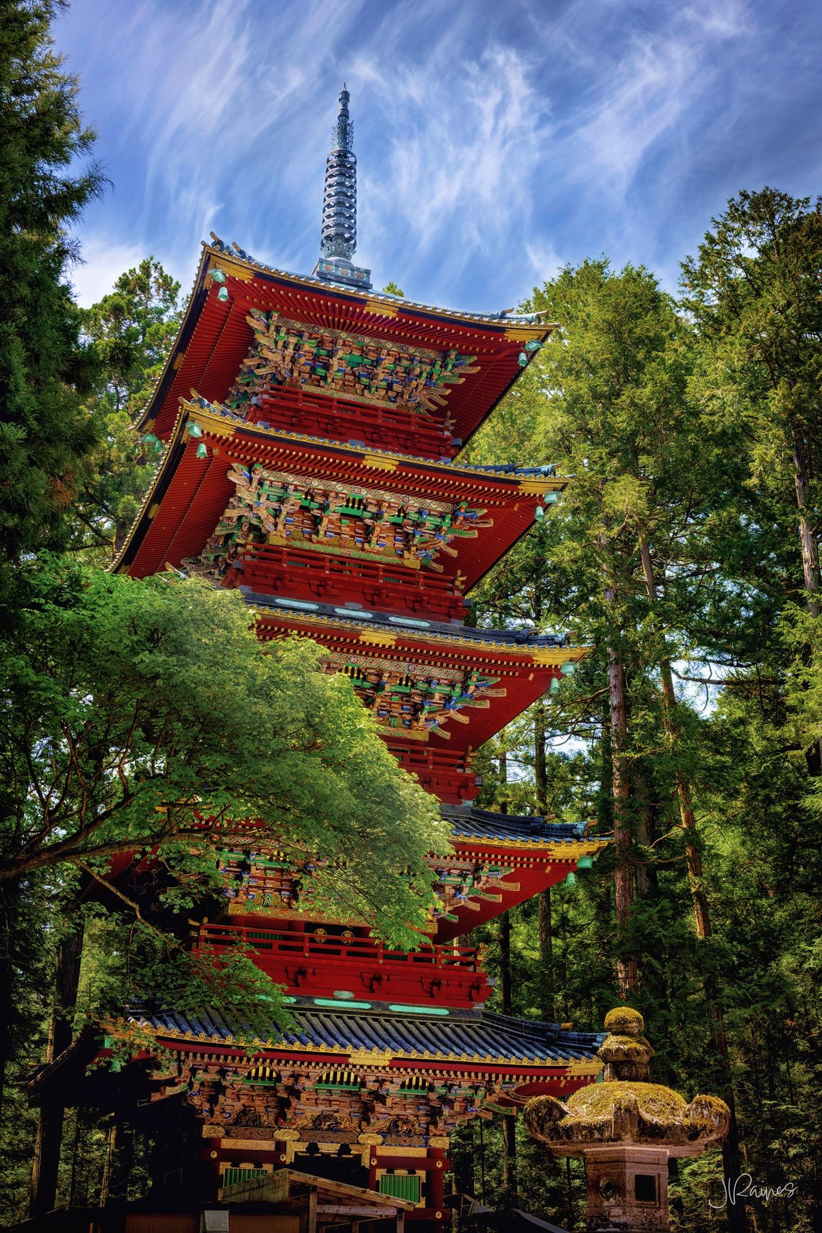 Colorful Japanese pagoda in the forest of Nikko