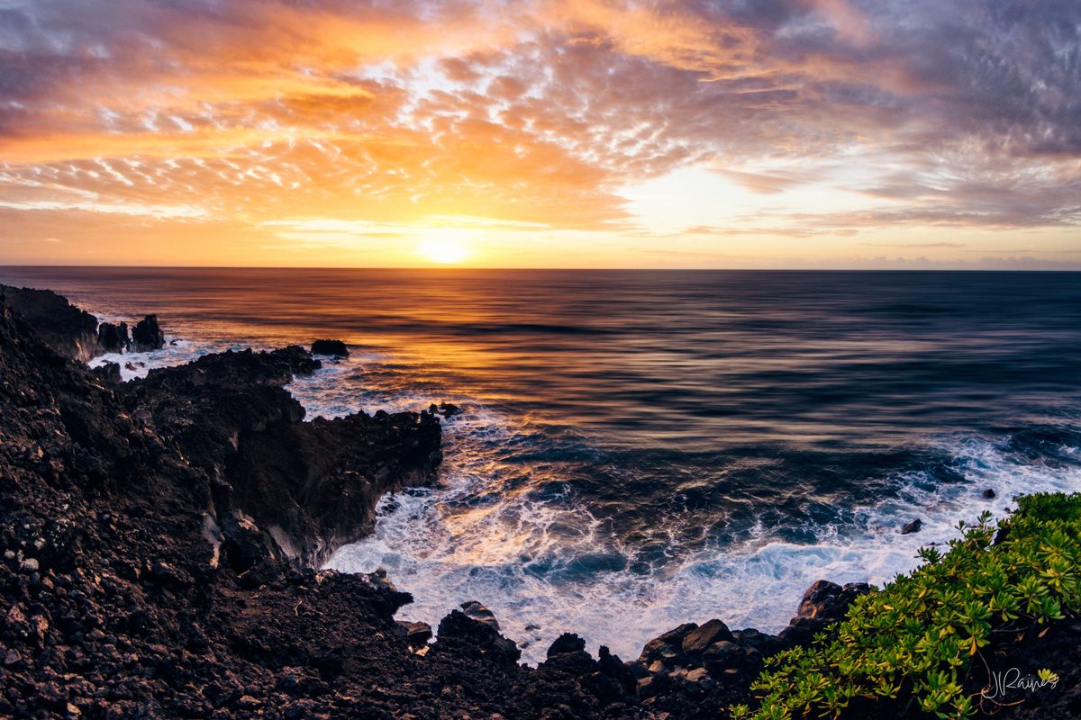 Hawaiian volcanic beach at sunrise