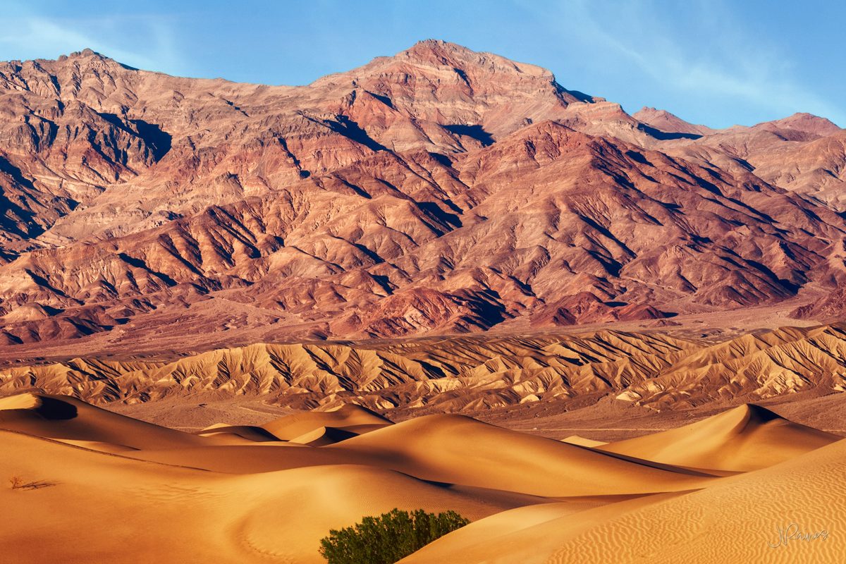 Sand dunes and mountain range in Death Valley