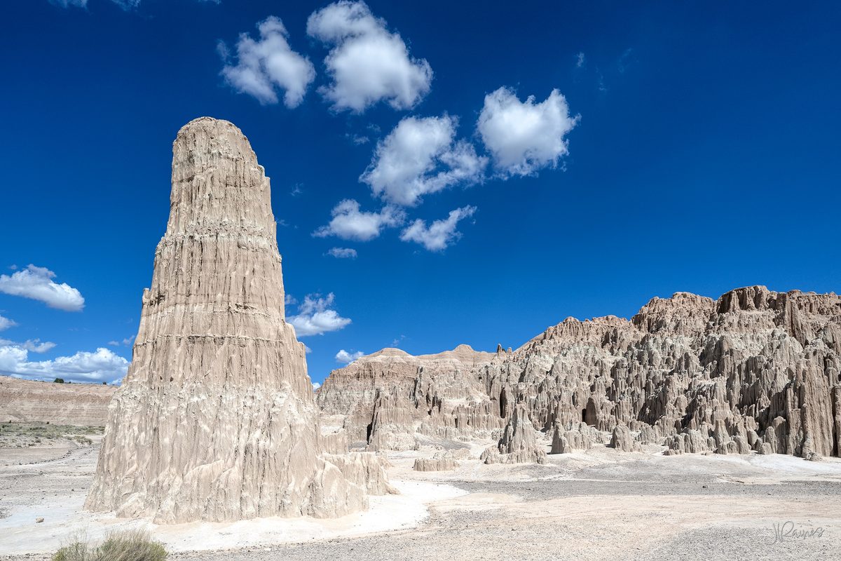 A tiered clay formation at Cathedral Gorge State Park, Nevada, rising in stacked levels against the sky