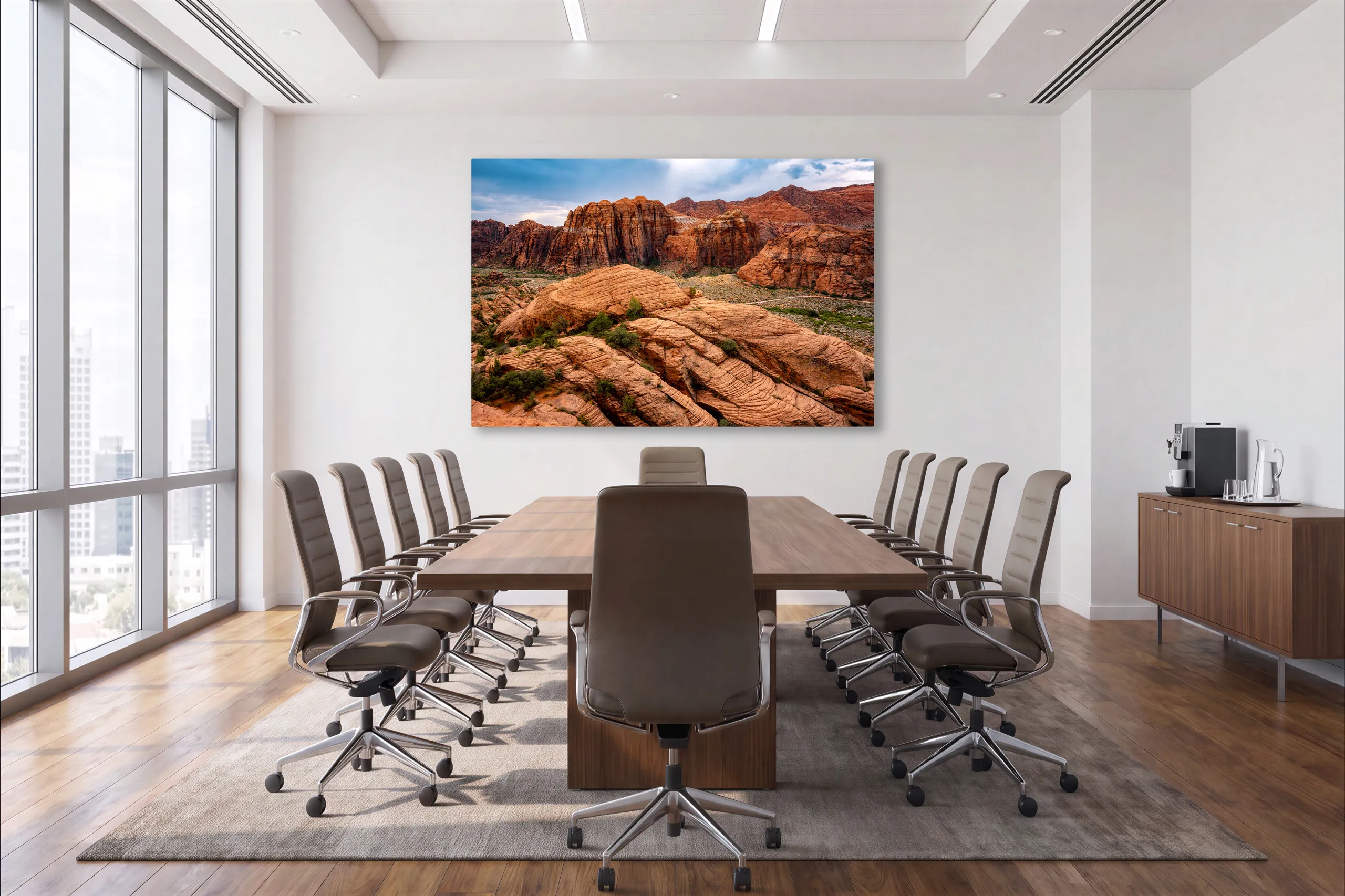 Snow Cliffs Ablaze, red sandstone formations, visualized on the end wall of a large boardroom