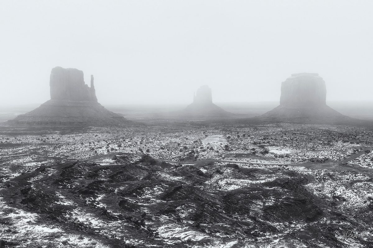 Snow across the buttes of Monument Valley