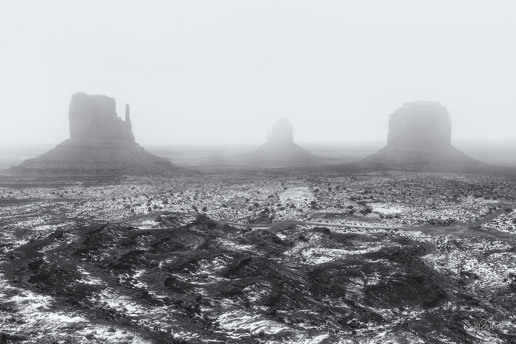 Snow across the buttes of Monument Valley