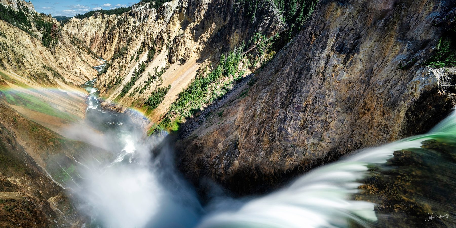 Water going over the lip in Yellowstone National Park, caught mid-fall
