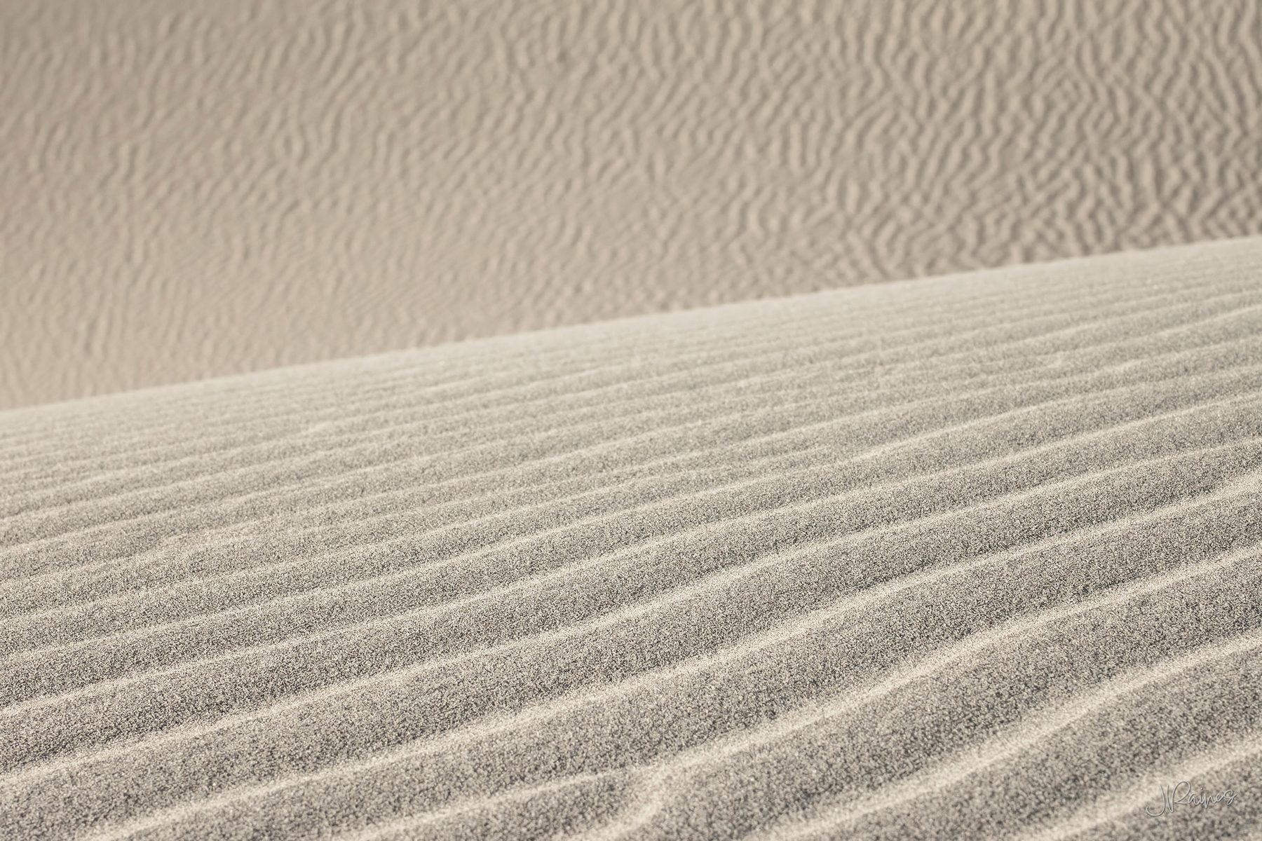 Wind-combed ripples across the dunes in Death Valley National Park, California