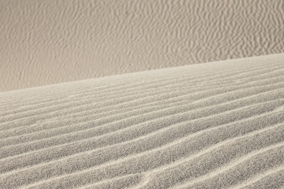 Wind-combed ripples across the dunes in Death Valley National Park, California